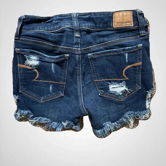 American Eagle Outfitters Blue Distressed Next Level Stretch Jean Shorts - Picture 2 of 4
